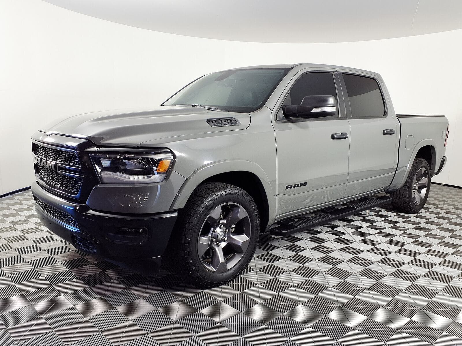 2023 Ram 1500 Big Horn, front three-quarter, dealer studio turntable